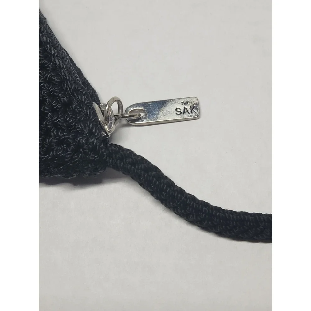 The‎ Sak Black Woven One Strap Crescent Purse